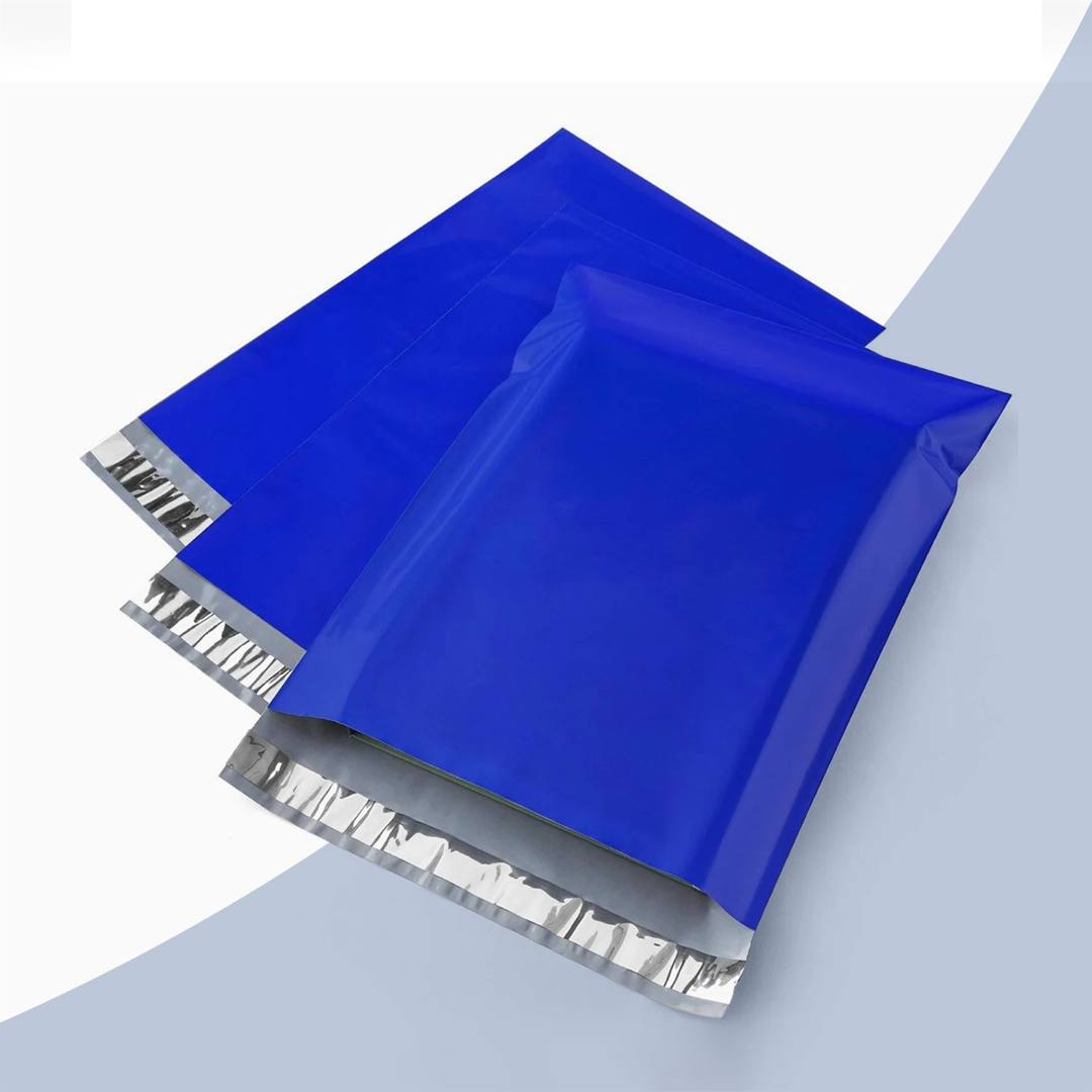 Two royal blue poly mailers angled to show the silver adhesive closure strip