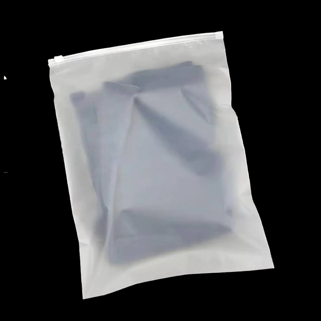Frosted zip poly bag holding a folded garment visible through the translucent film