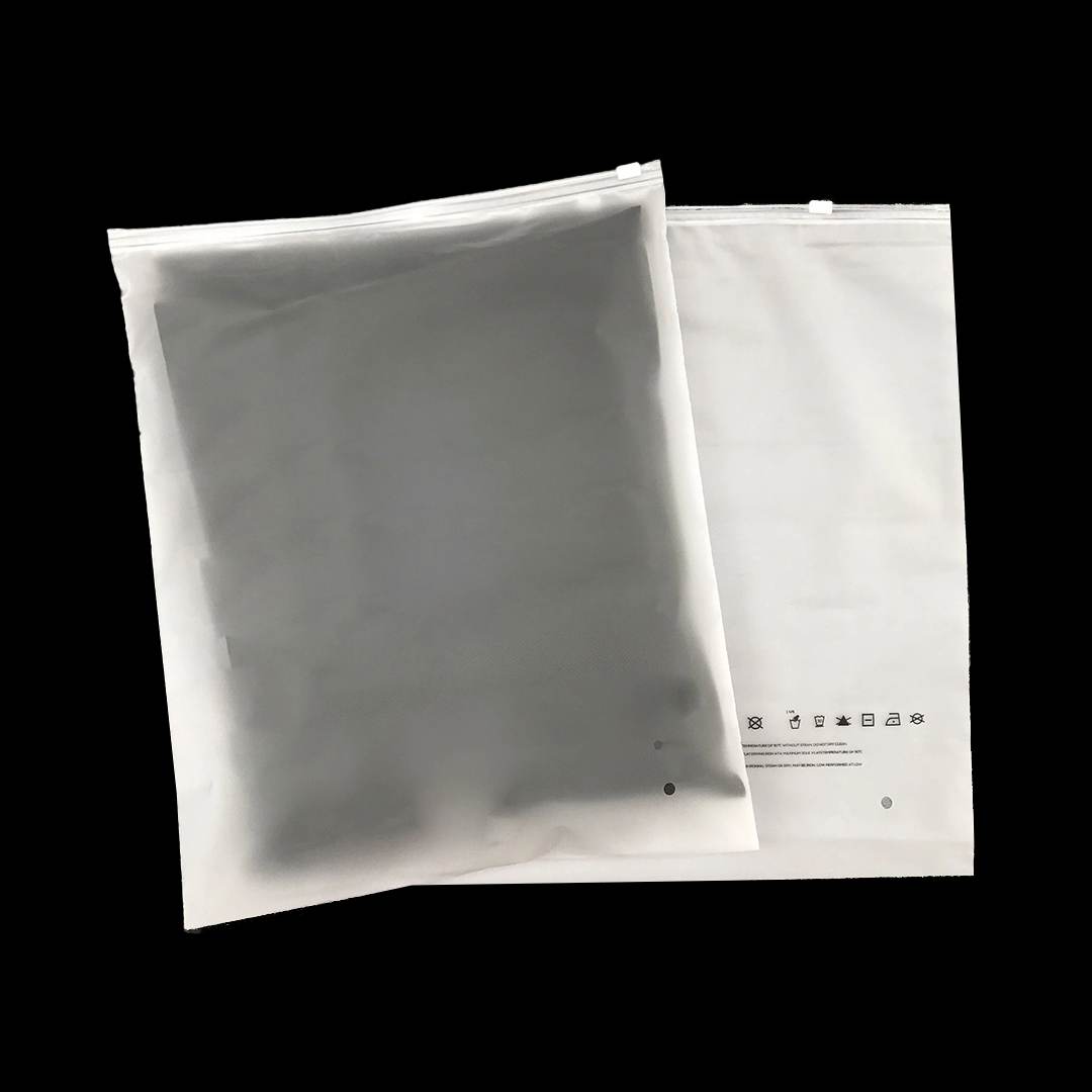Two frosted zip poly bags, one printed with a row of garment care symbols