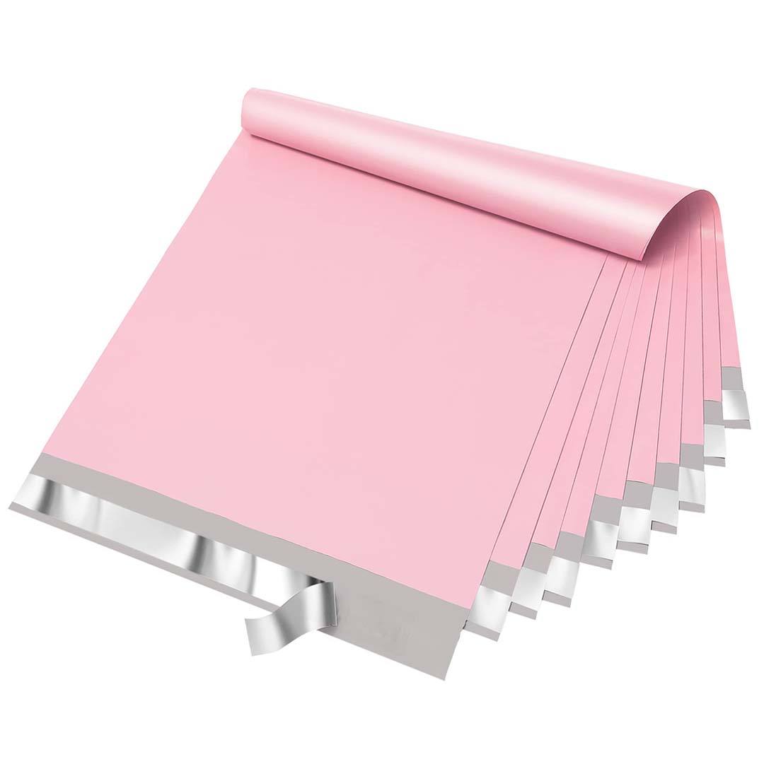 Small pale pink mailers spread out to show how little bench space a small format takes