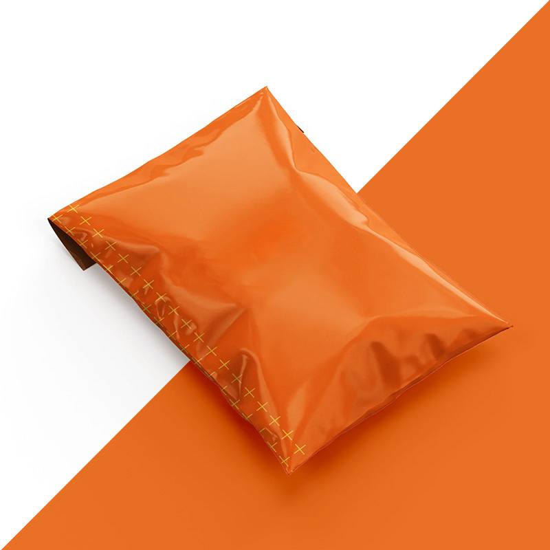 Orange poly mailer with a printed cross pattern running along the sealed edge
