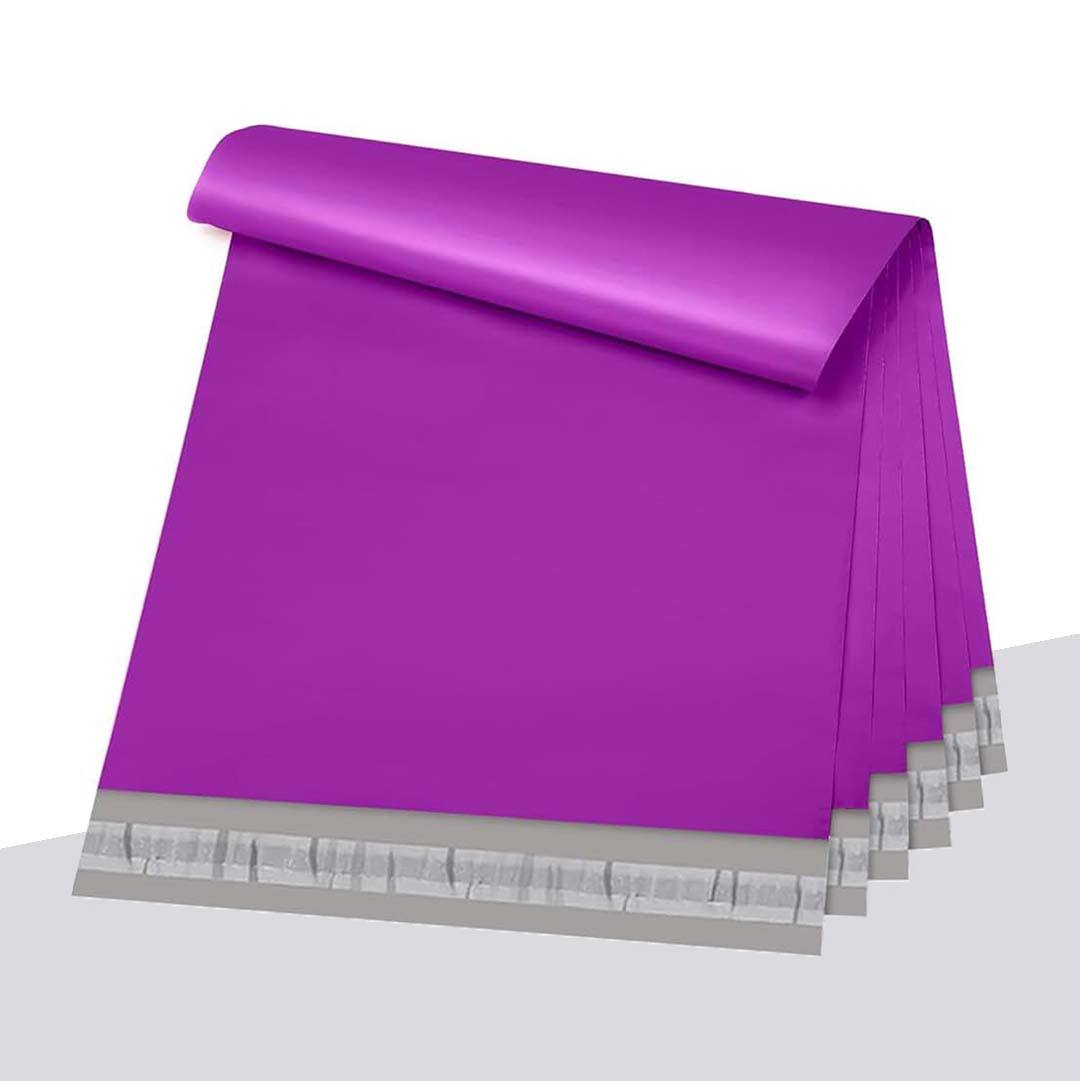 Rolled stack of purple poly mailers showing the adhesive strip along the open edge