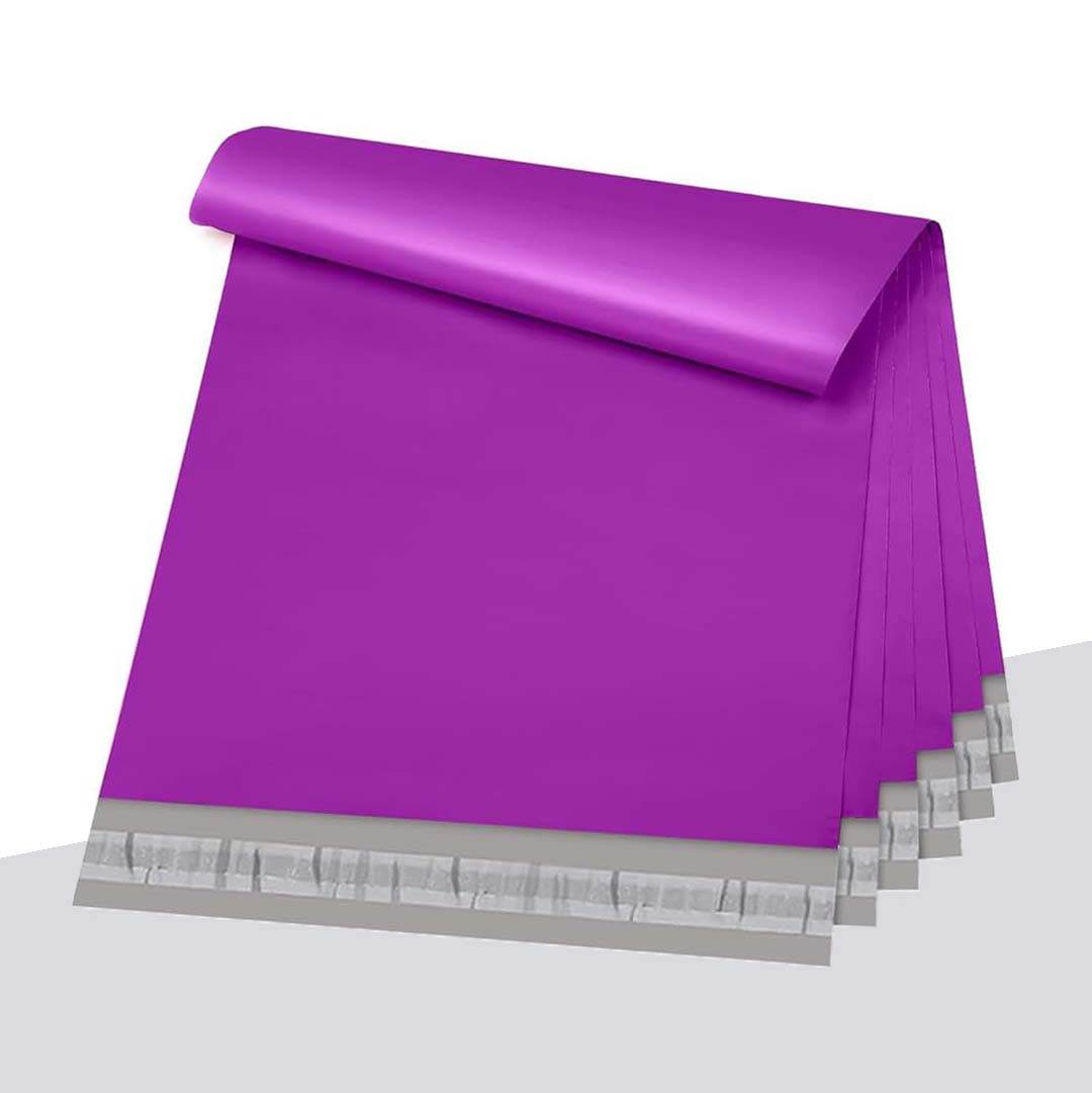 Rolled stack of purple poly mailers showing the adhesive strip along the open edge
