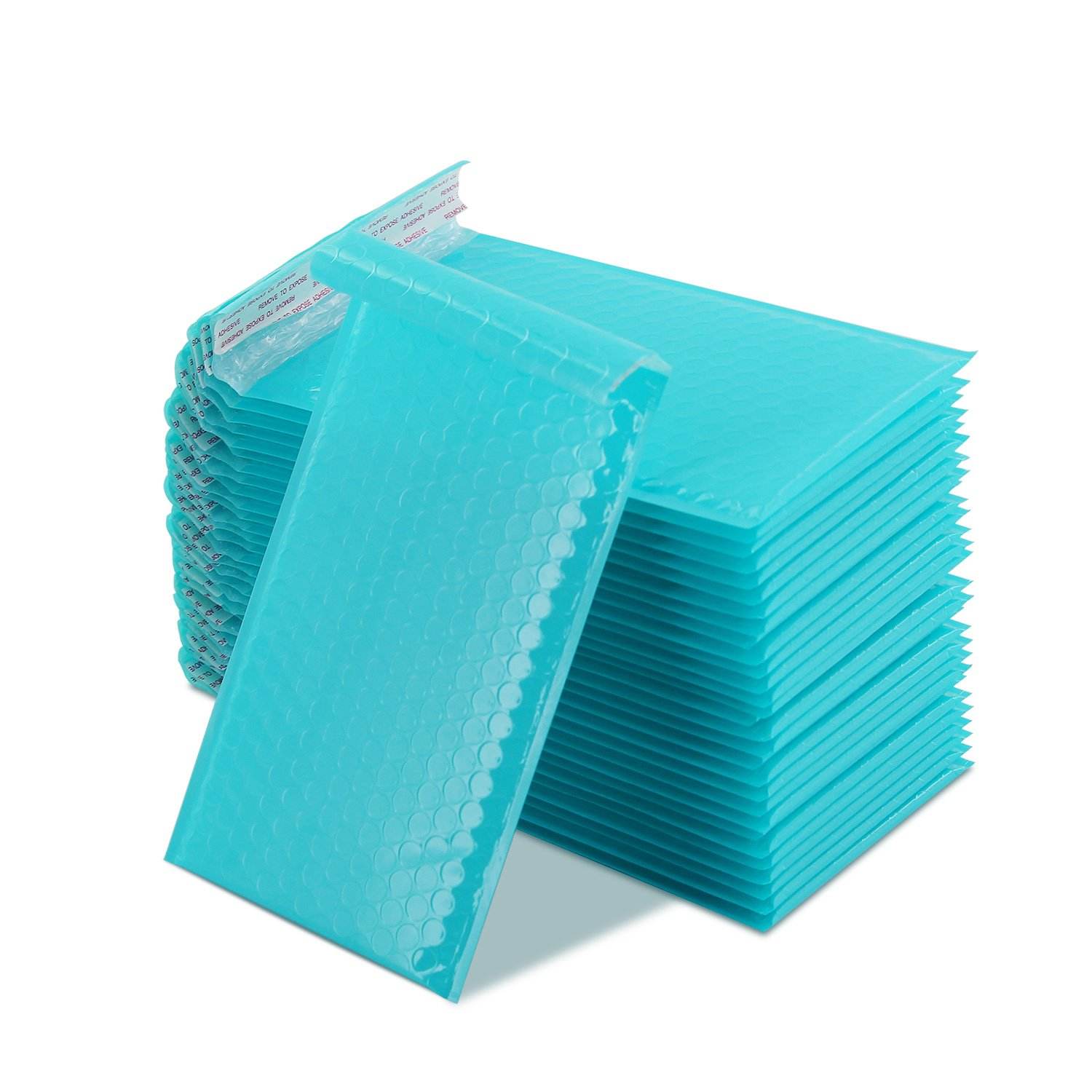 Stack of teal cushioned mailers with the dimpled bubble lining visible through the film