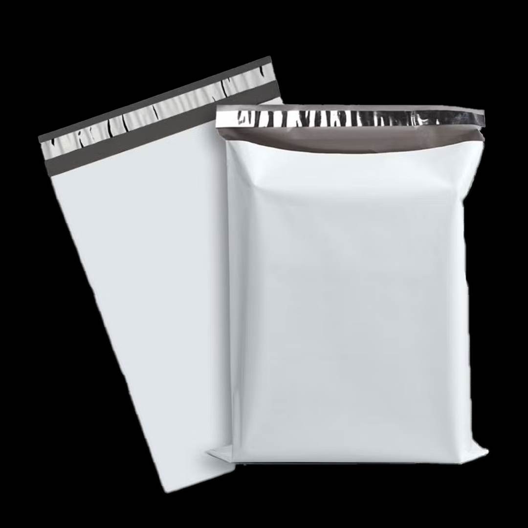 White poly mailer shown packed alongside an empty flat one on a plain background