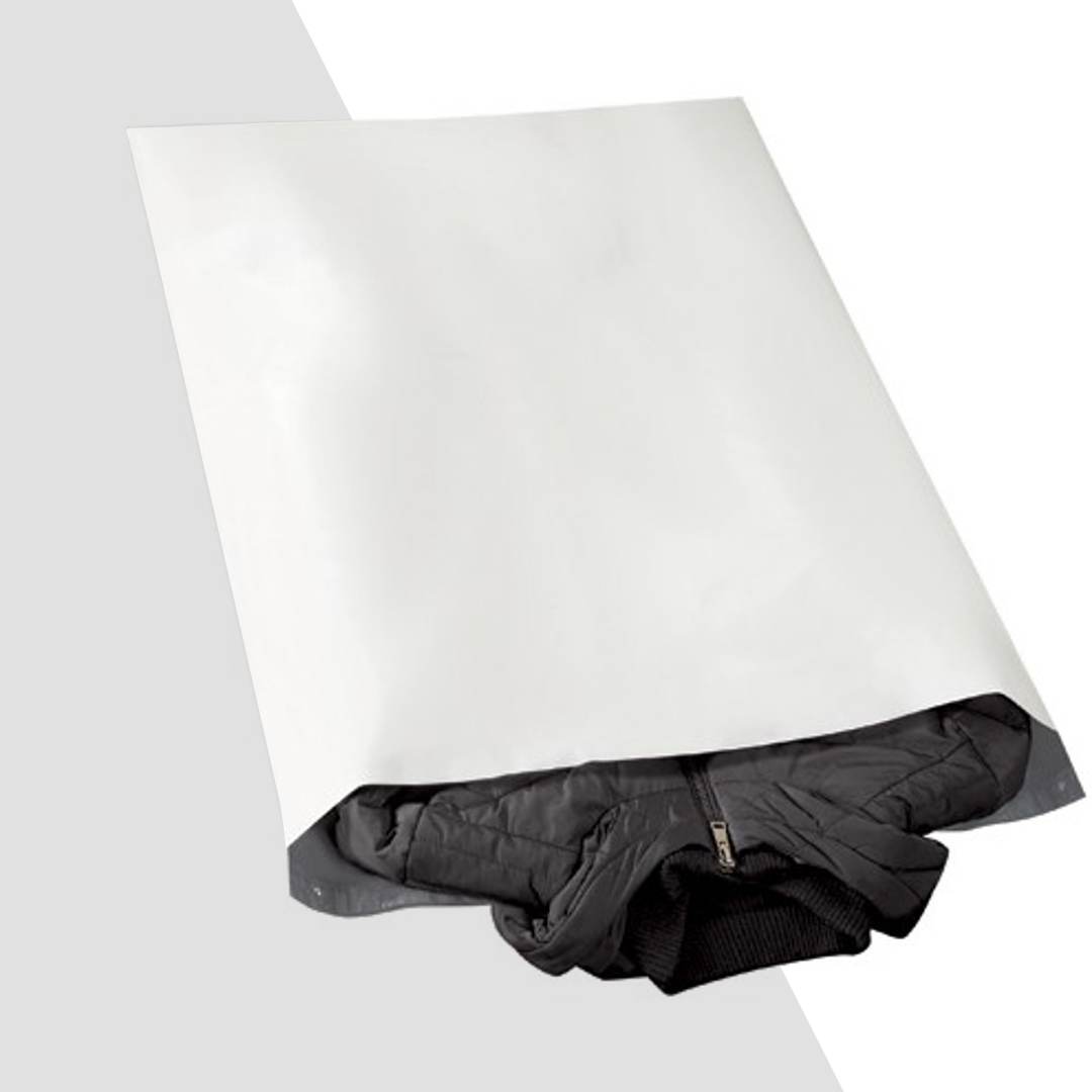 Large white poly mailer opened to show a folded black quilted jacket inside