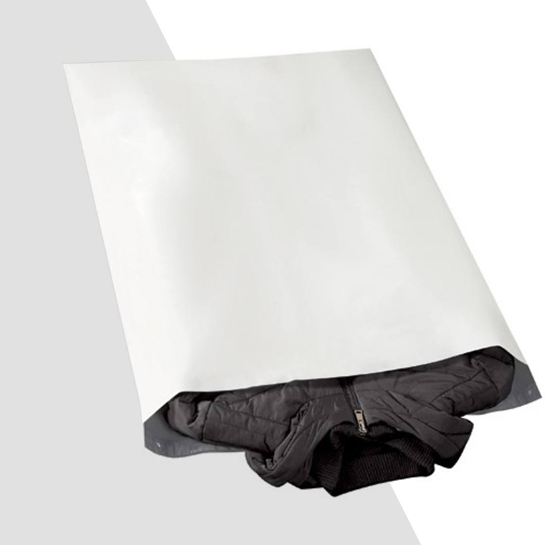 Oversized white mailer opened around a thick folded garment to show the usable depth