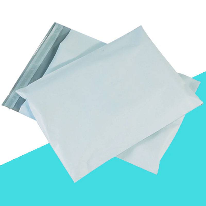 Two white poly mailers overlapping, the upper one showing its open adhesive flap